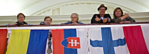 People on balcony inside Kino Rodina.